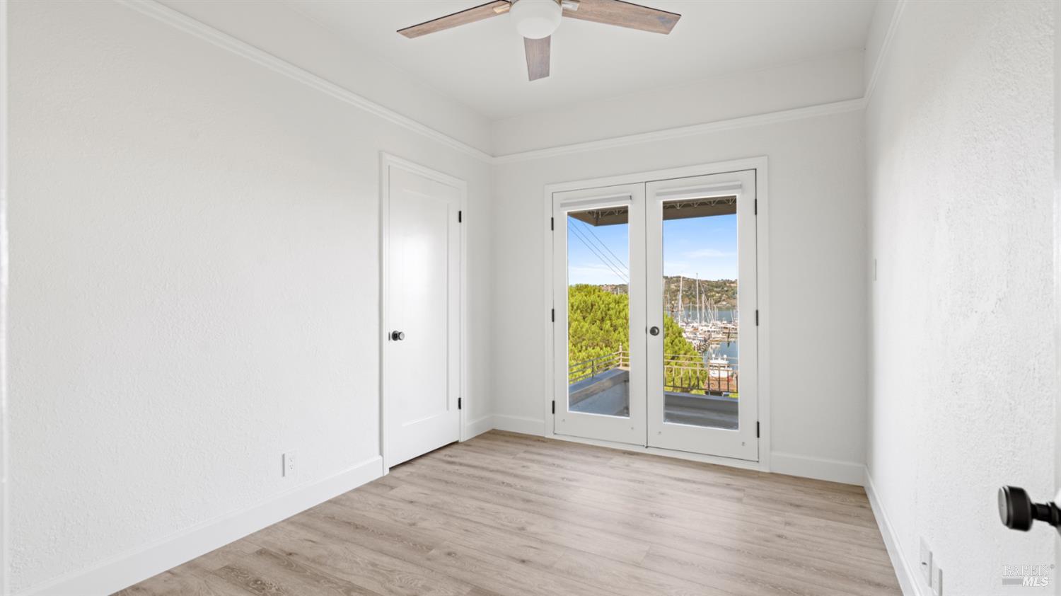 833 Bridgeway, Unit 5 Sausalito, CA 94965 - Photo 7 of 26 wooden floor in an empty room