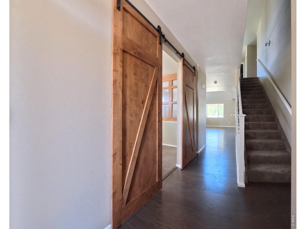 10434 Bluegrass Street Firestone, CO 80504 - Photo 3 of 26 Beautiful custom barn door to your office/den