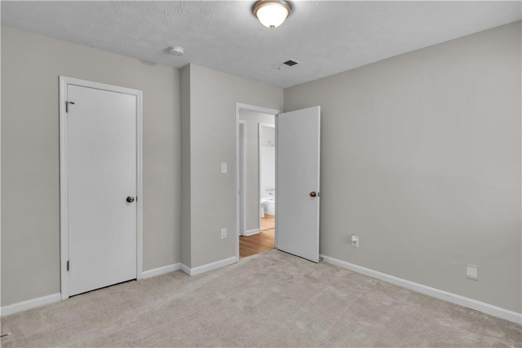 5796 Bobbin Lane Lithonia, GA 30058 - Photo 11 of 17 a view of an empty room