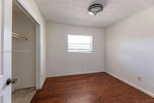 an empty room with a door