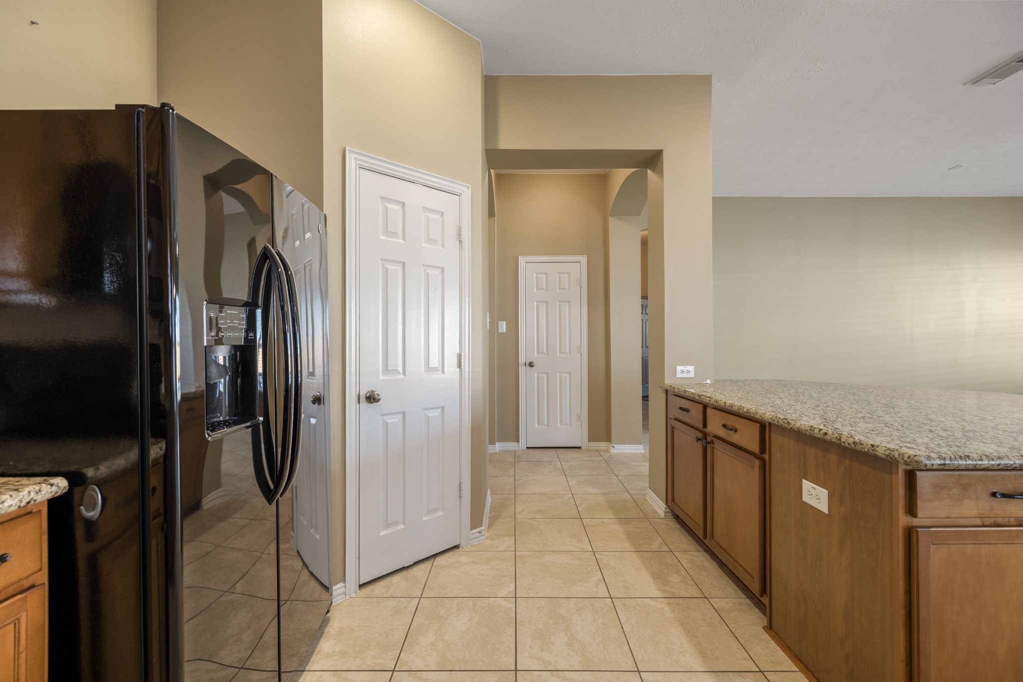 20014 Queens Oak Court Spring, TX 77379 - Photo 17 of 49 a kitchen with stainless steel appliances granite countertop a refrigerator and a sink