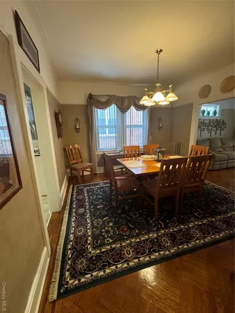 a room with table tennis table and chairs