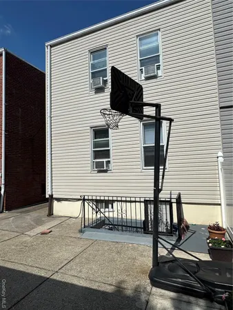 a view of a house with large windows