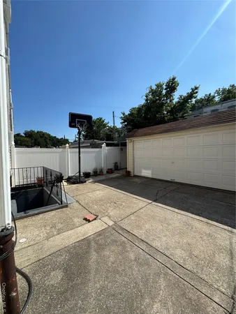 a view of roof and car parked