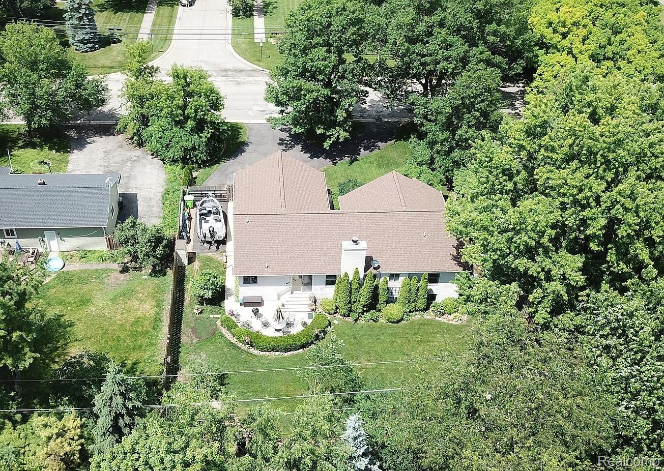 2670 East Wardlow Road Highland, MI 48356 - Photo 8 of 99 Ariel view, back of home. Concrete patio