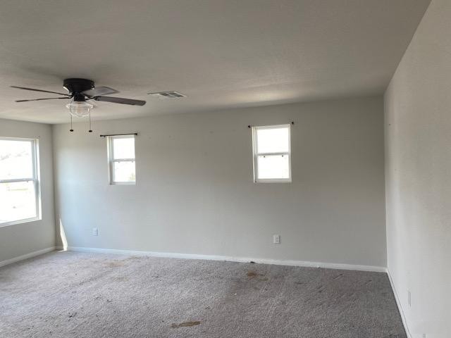 15532 Taylorcrest Drive Conroe, TX 77306 - Photo 17 of 36 an empty room with windows and closet