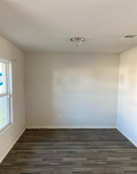 15532 Taylorcrest Drive Conroe, TX 77306 - Photo 23 of 36 a view of an empty room with wooden floor and windows