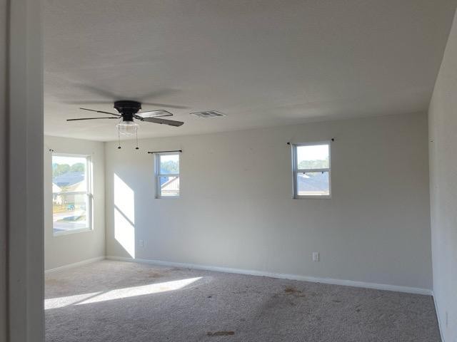 15532 Taylorcrest Drive Conroe, TX 77306 - Photo 26 of 36 an empty room with windows