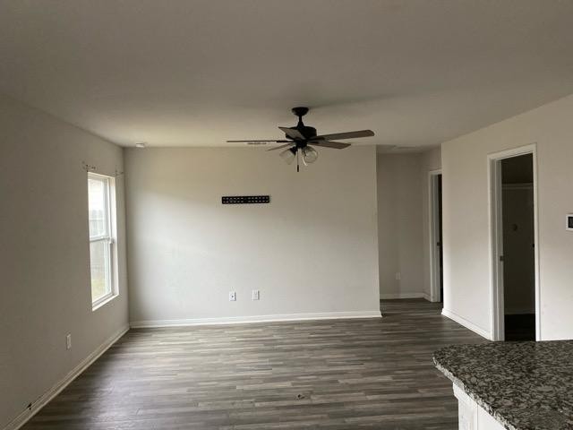 15532 Taylorcrest Drive Conroe, TX 77306 - Photo 28 of 36 a view of an empty room with wooden floor and a window