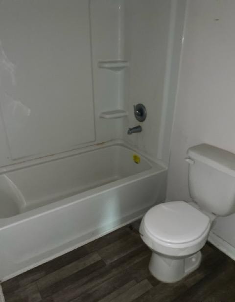 15532 Taylorcrest Drive Conroe, TX 77306 - Photo 32 of 36 a white toilet sitting next to a bath tub