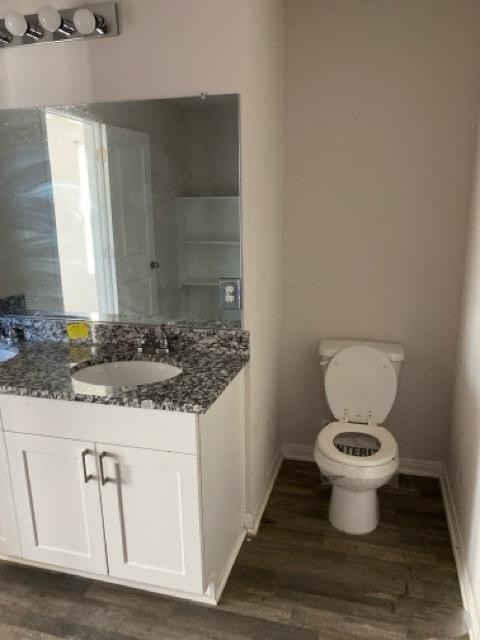 15532 Taylorcrest Drive Conroe, TX 77306 - Photo 34 of 36 a bathroom with a toilet and a sink