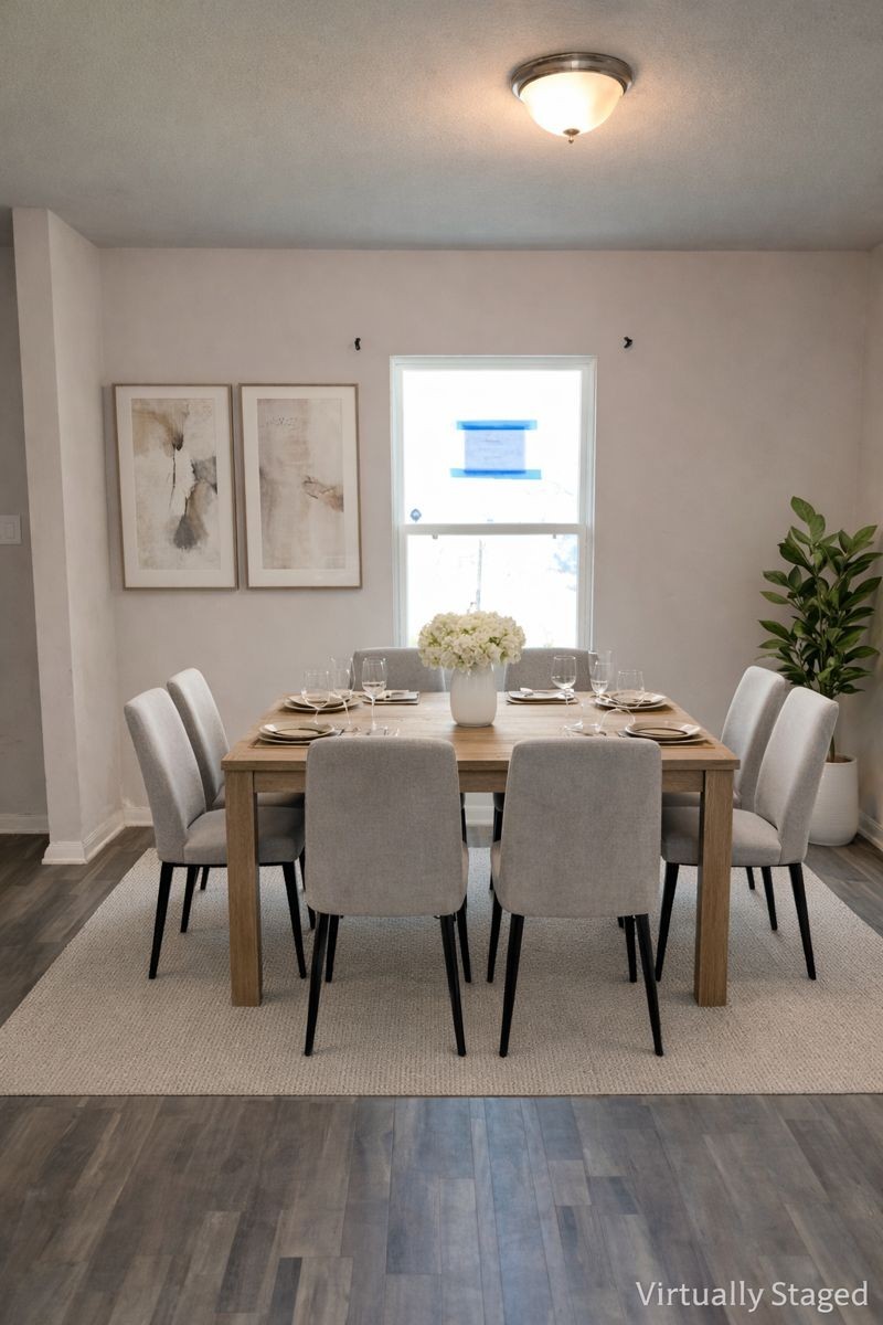 15532 Taylorcrest Drive Conroe, TX 77306 - Photo 4 of 36 a view of a dining room with furniture and wooden floor