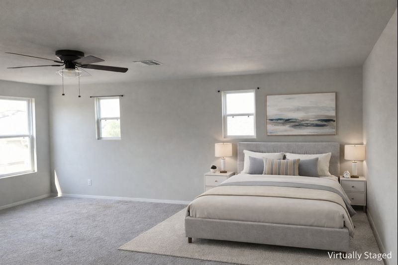 15532 Taylorcrest Drive Conroe, TX 77306 - Photo 6 of 36 a bedroom with a large bed and a window