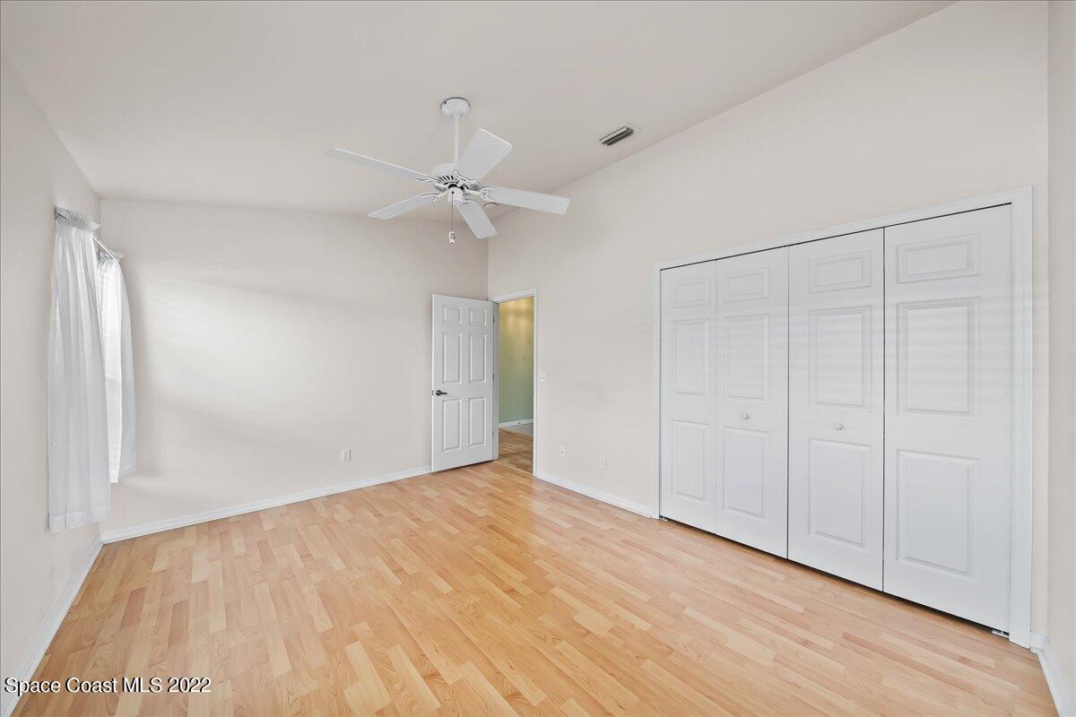 1965 Sundew Court Northeast Palm Bay, FL 32905 - Photo 25 of 29 a view of an empty room with a window