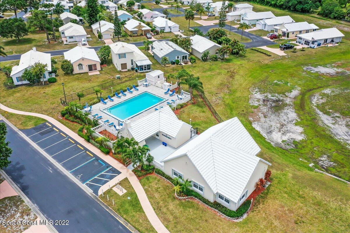 1965 Sundew Court Northeast Palm Bay, FL 32905 - Photo 3 of 29 an aerial view of a house