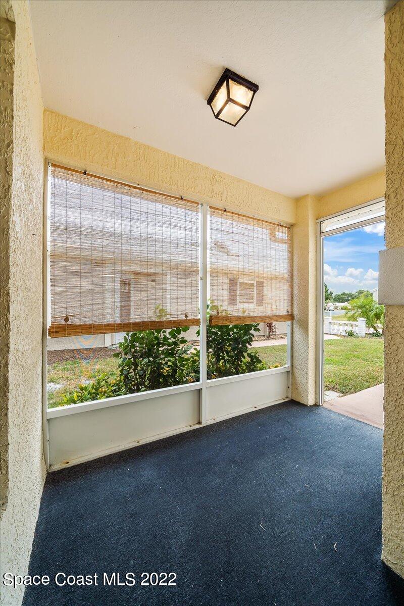 1965 Sundew Court Northeast Palm Bay, FL 32905 - Photo 6 of 29 a view of an empty room with a window
