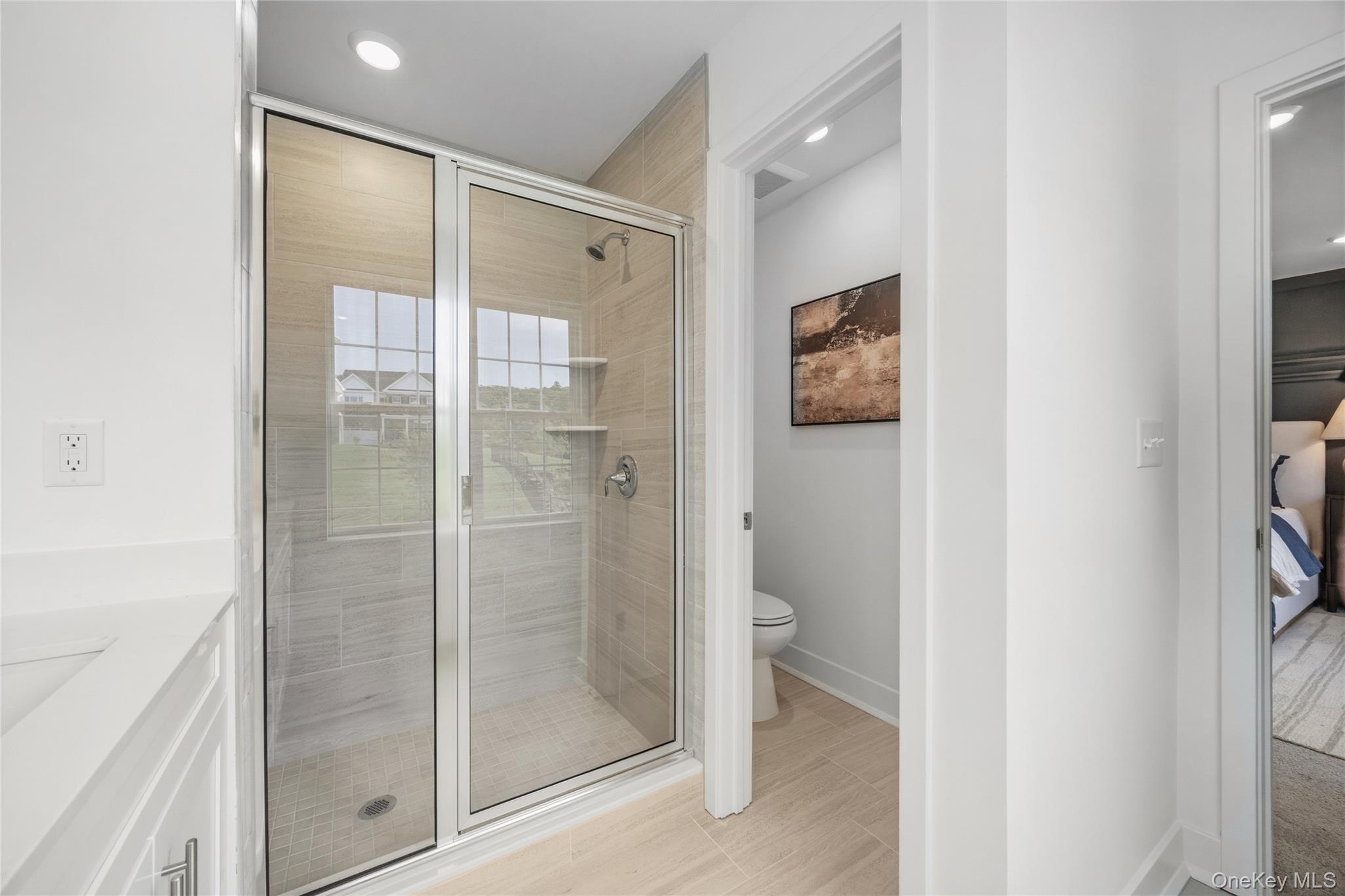 154 Pine Ridge Road Tuxedo Park, NY 10987 - Photo 20 of 25 a bathroom with a shower and a toilet
