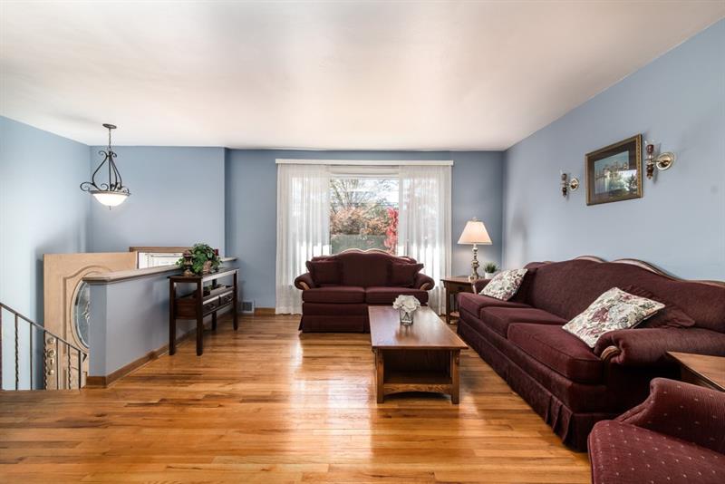 13 Rolling Road Cranberry Township, PA 16066 - Photo 2 of 24 Beautiful hardwood floors in Living Room and 3 bedrooms. Updated light fixture in entry.