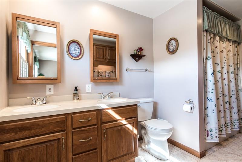 13 Rolling Road Cranberry Township, PA 16066 - Photo 16 of 24 Updated bathroom with dual vanity and ceramic tile flooring.