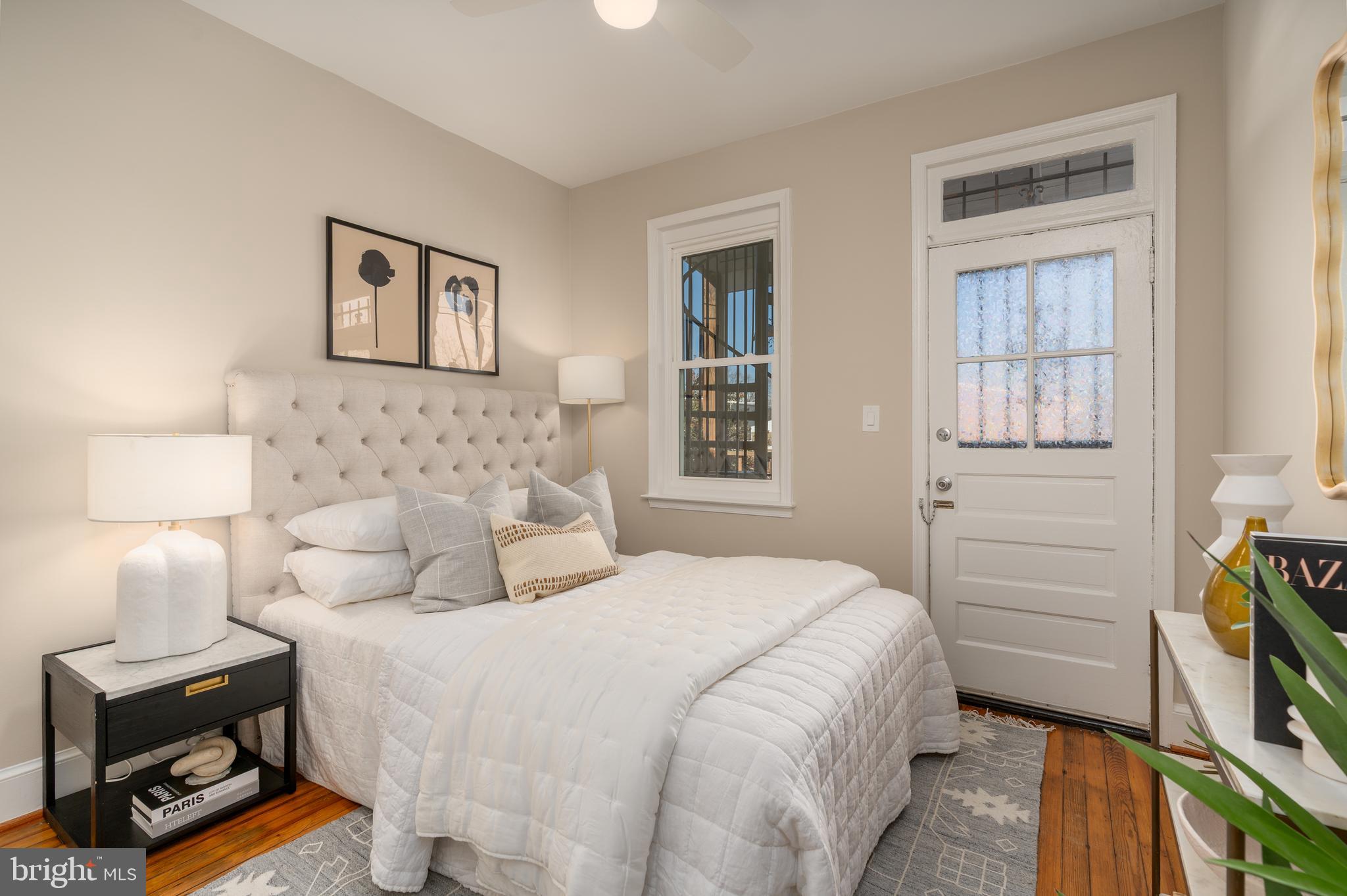 1218 D Street Southeast, Unit 4 Washington, DC 20003 - Photo 20 of 30 a bedroom with a bed and a night stand