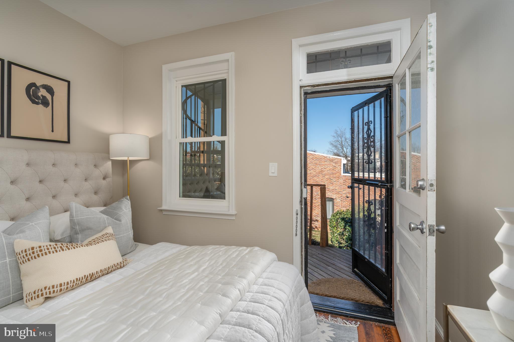 1218 D Street Southeast, Unit 4 Washington, DC 20003 - Photo 22 of 30 a bedroom with a bed and a window