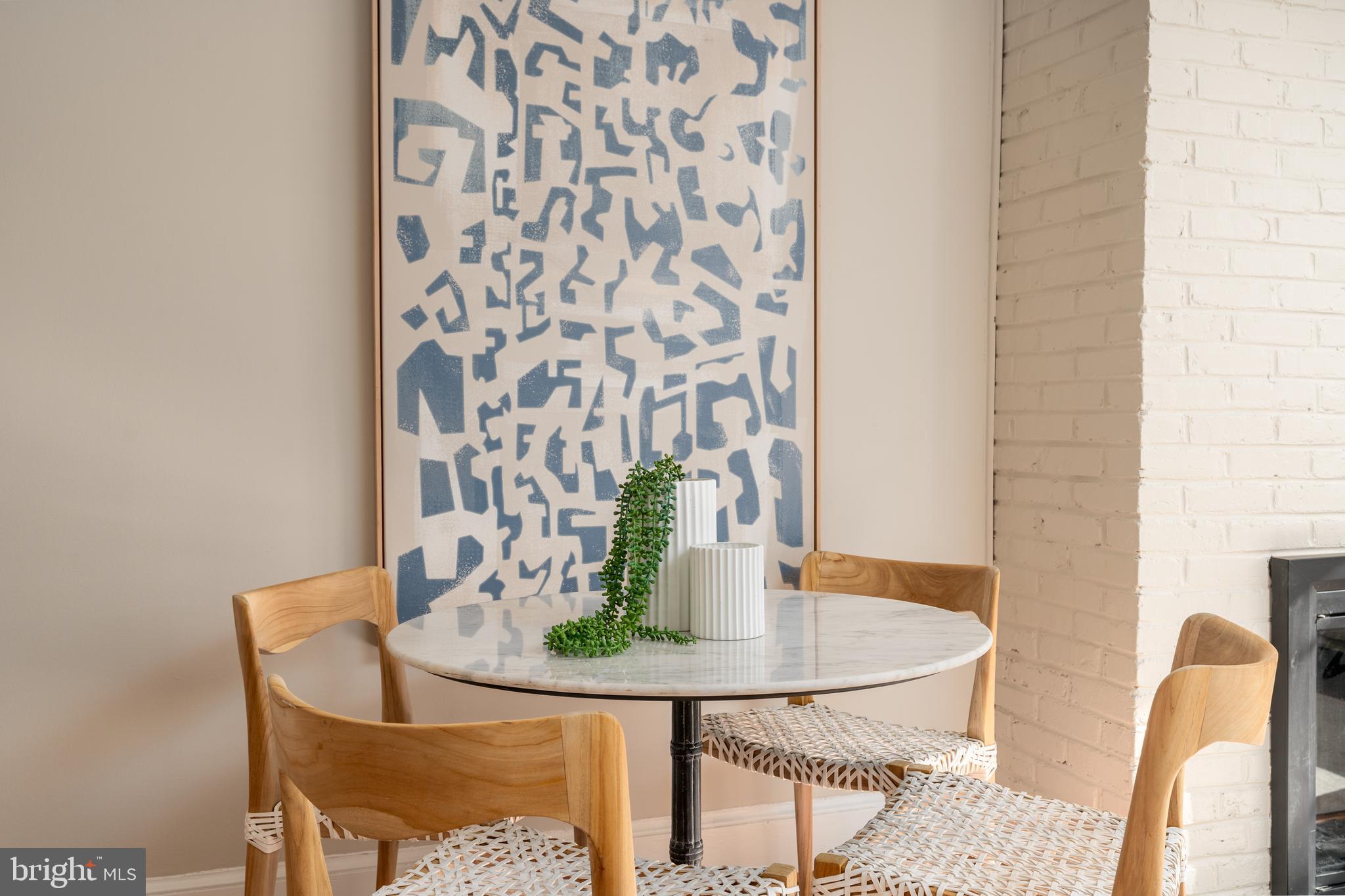 1218 D Street Southeast, Unit 4 Washington, DC 20003 - Photo 6 of 30 a dining room with furniture and wooden floor