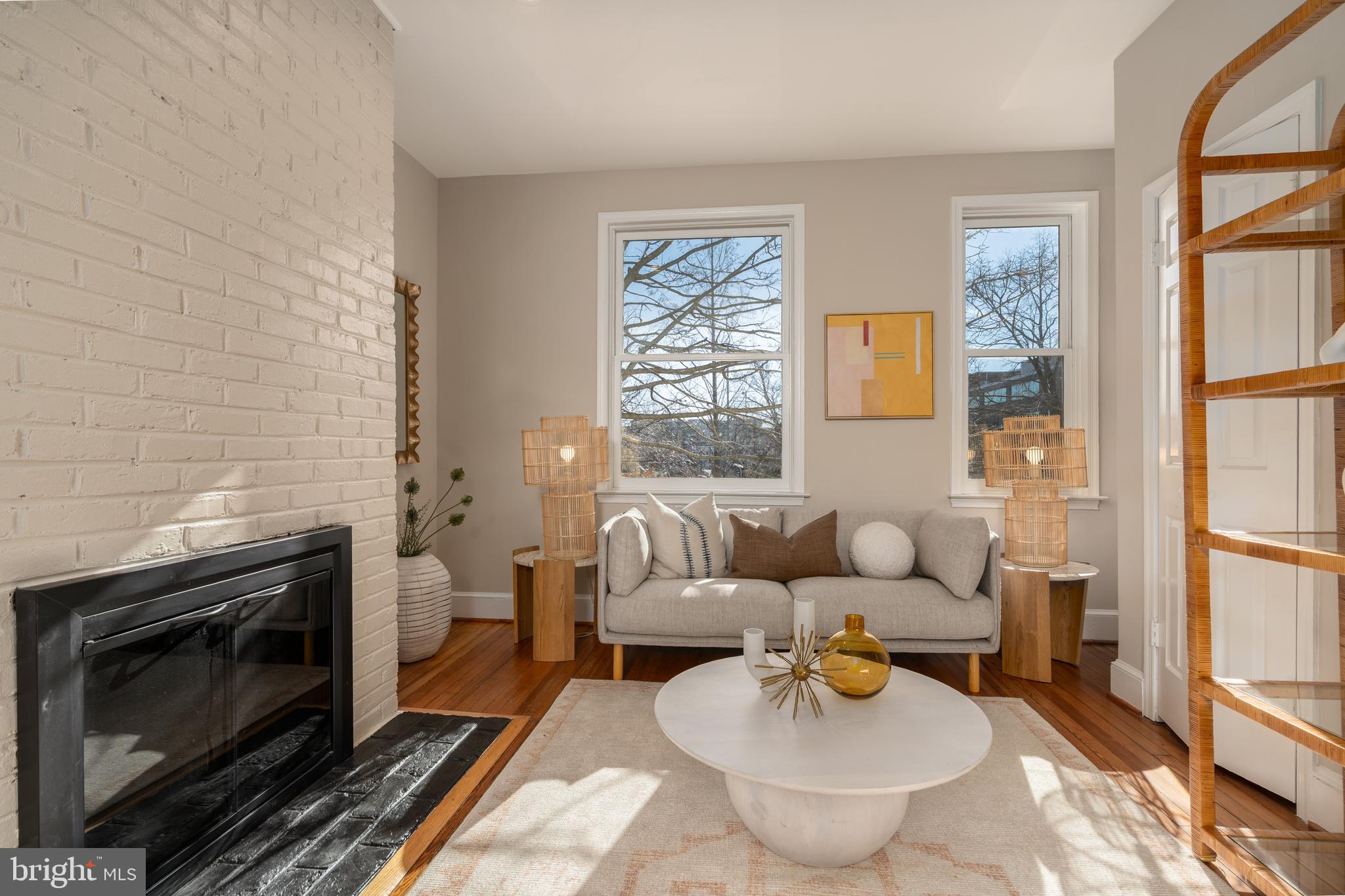 1218 D Street Southeast, Unit 4 Washington, DC 20003 - Photo 8 of 30 a living room with furniture and a fireplace