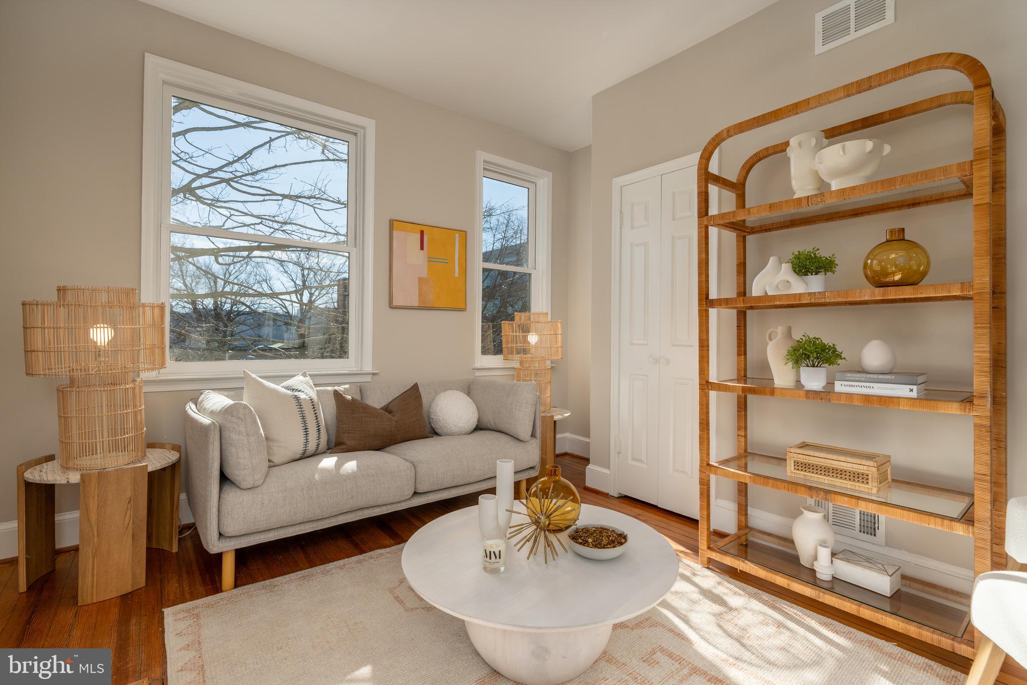 1218 D Street Southeast, Unit 4 Washington, DC 20003 - Photo 9 of 30 a living room with furniture and a window