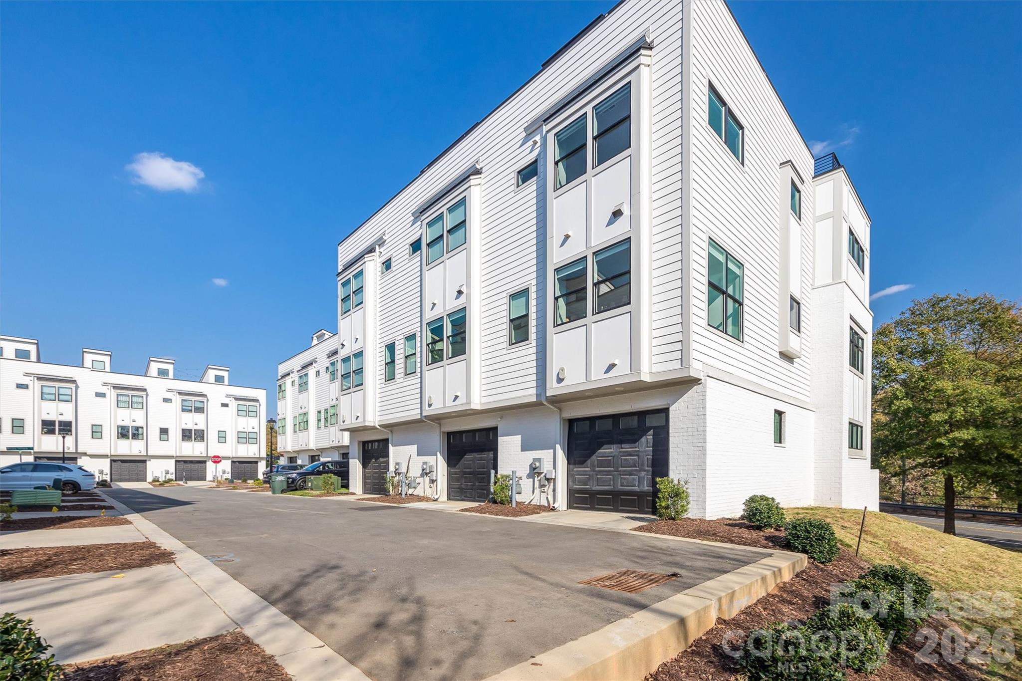 2319 Wesley Village Road Charlotte, NC 28208 - Photo 39 of 44 a view of a building with a street