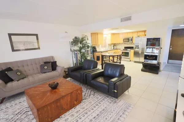 a living room with furniture and a couch