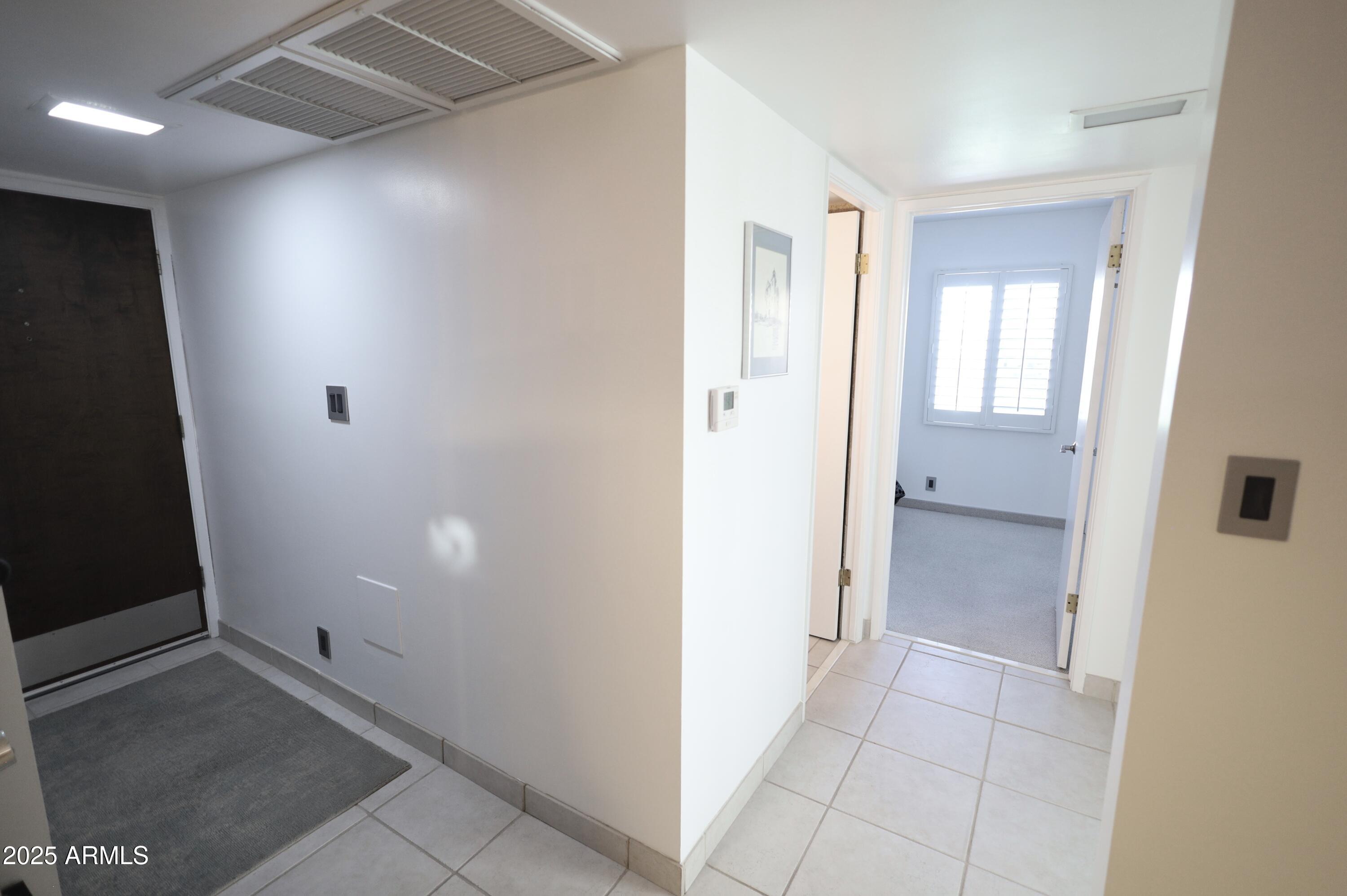 7820 East Camelback Road, Unit 309 Scottsdale, AZ 85251 - Photo 21 of 55 a view of a hallway