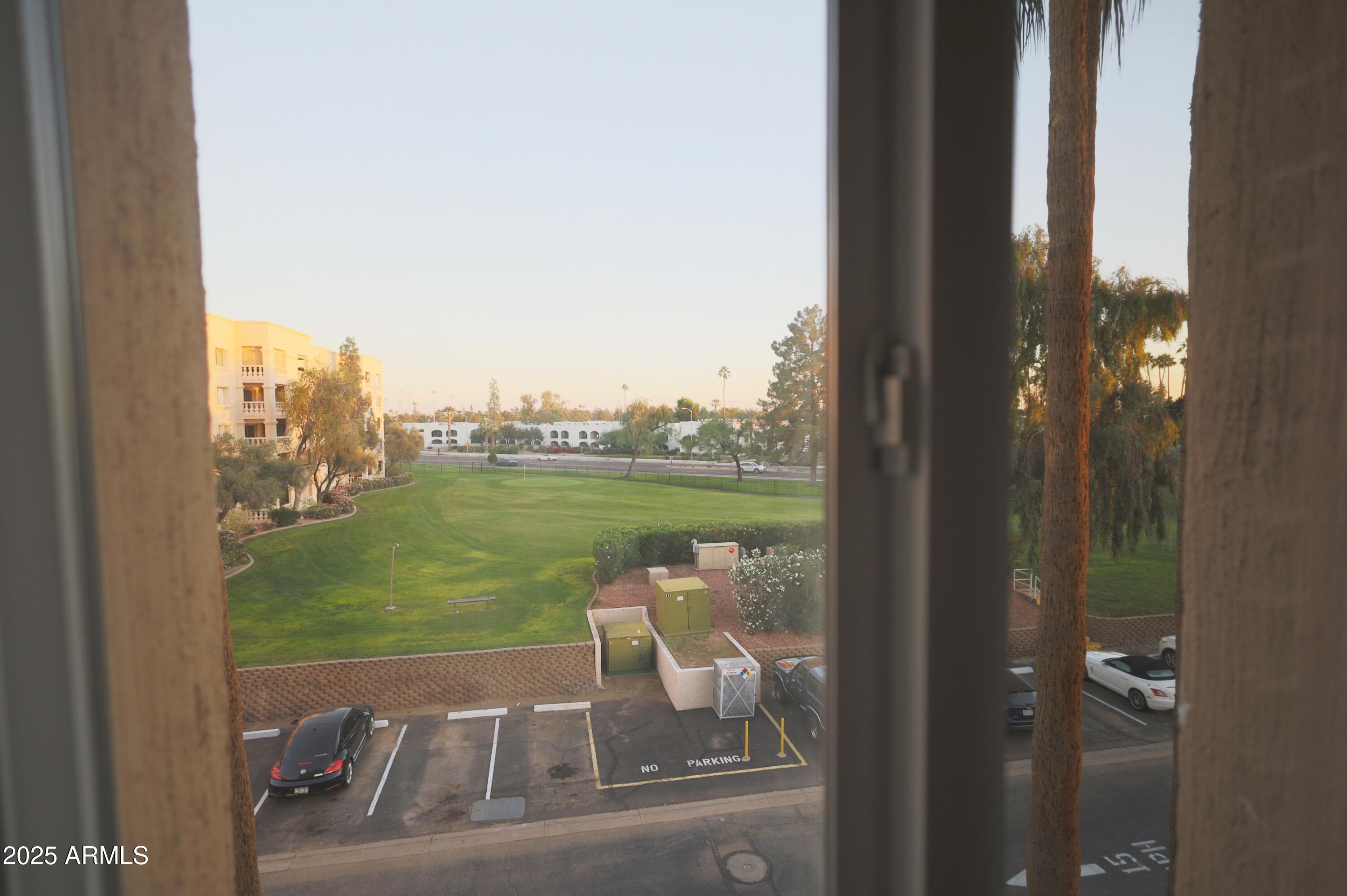 7820 East Camelback Road, Unit 309 Scottsdale, AZ 85251 - Photo 26 of 55 a view of swimming pool from balcony