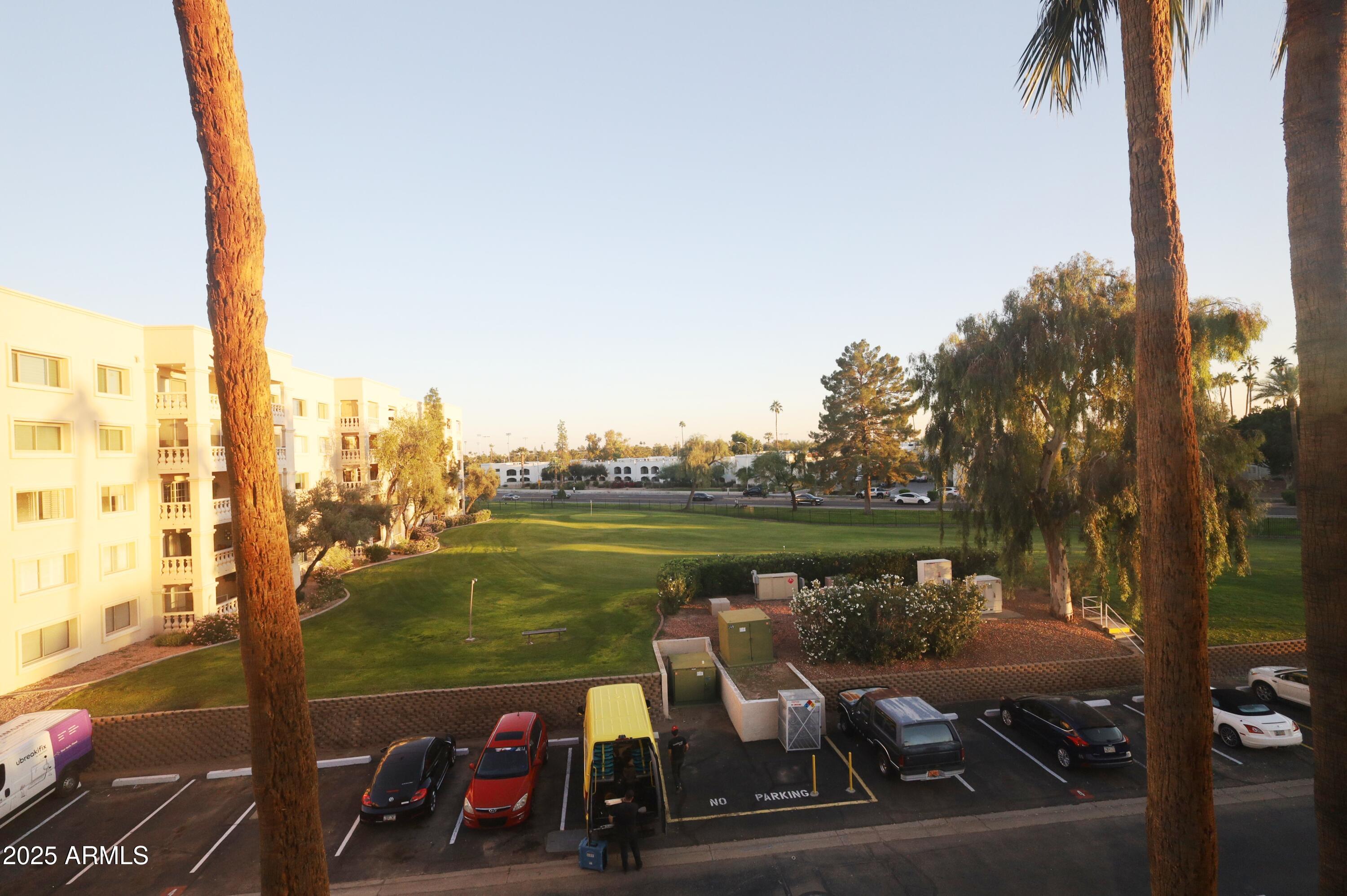 7820 East Camelback Road, Unit 309 Scottsdale, AZ 85251 - Photo 27 of 55 a view of a lake with couches and city view