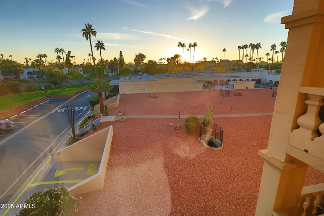 an outdoor view of a garden with seating area