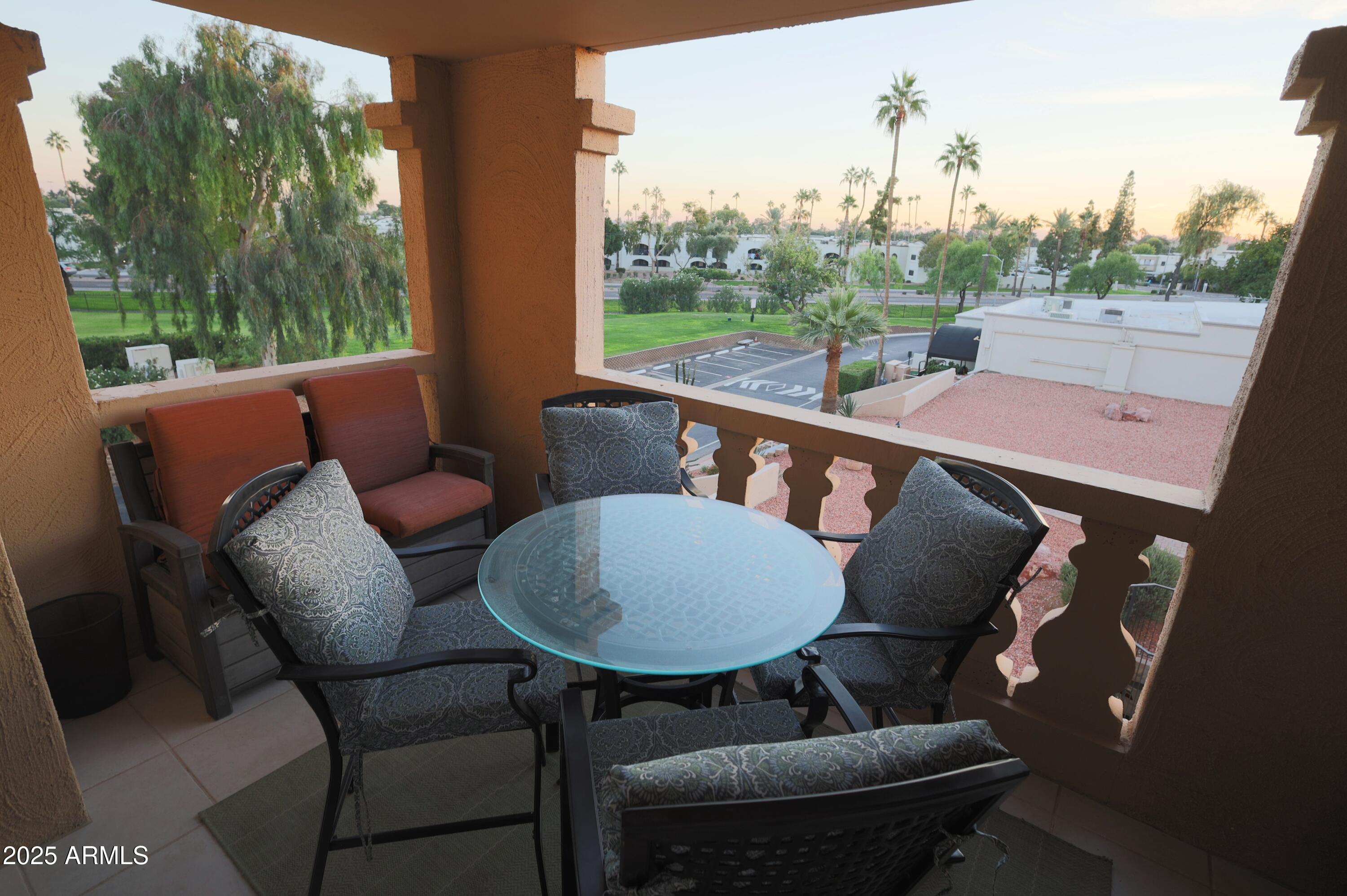 7820 East Camelback Road, Unit 309 Scottsdale, AZ 85251 - Photo 34 of 55 a outdoor dining space with furniture and garden view