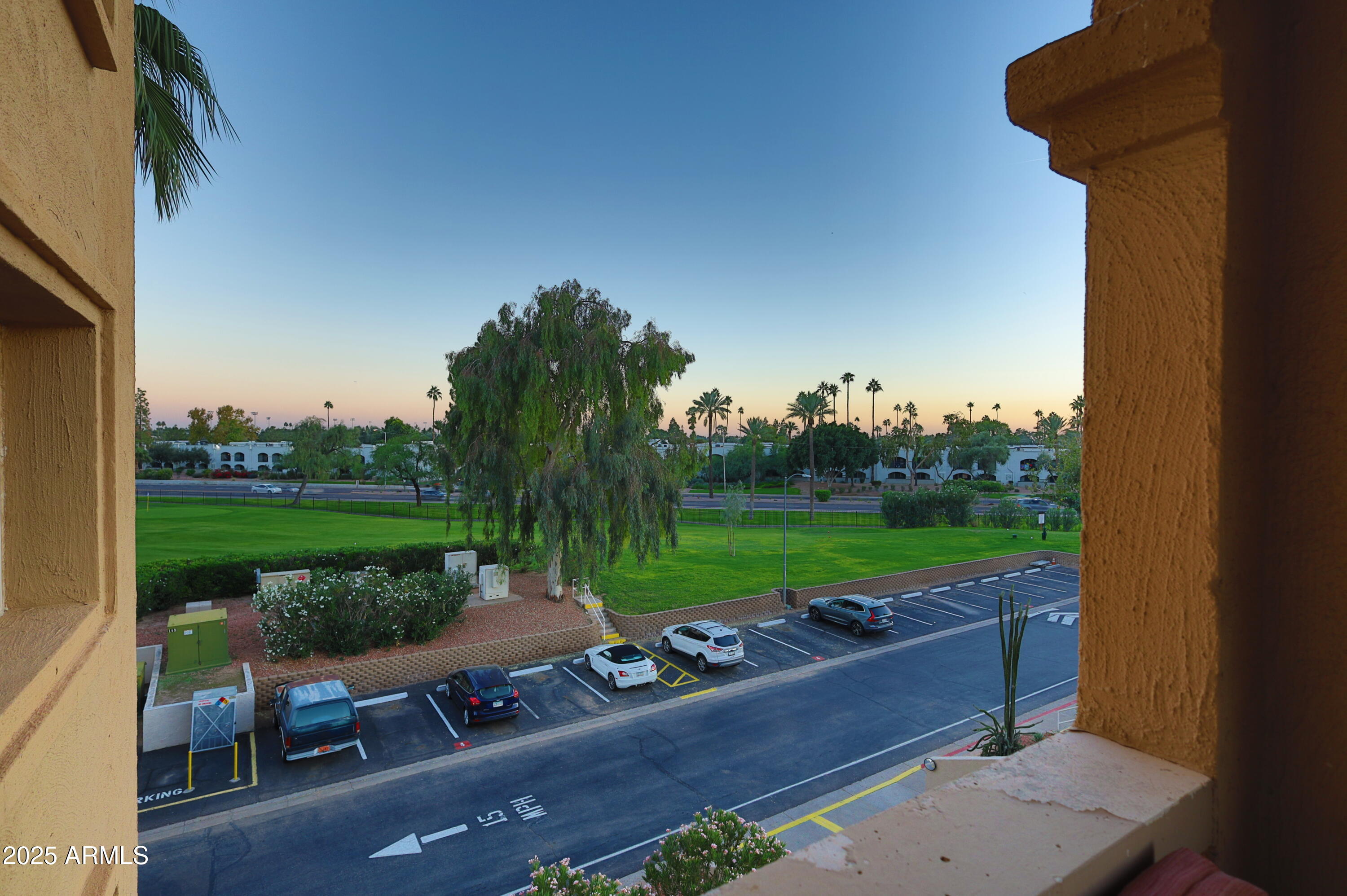 7820 East Camelback Road, Unit 309 Scottsdale, AZ 85251 - Photo 35 of 55 an outdoor view of a garden with seating area