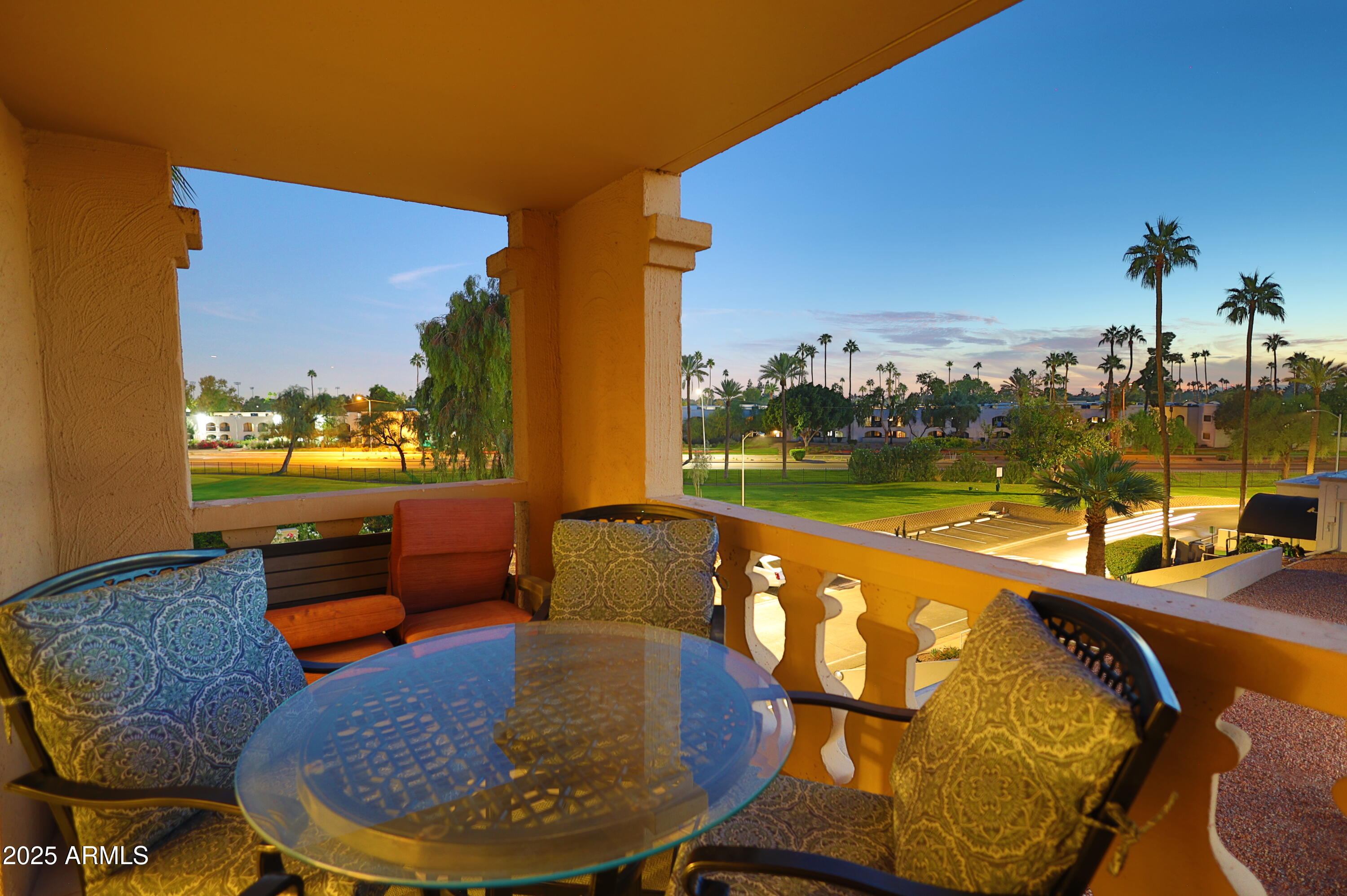 7820 East Camelback Road, Unit 309 Scottsdale, AZ 85251 - Photo 3 of 55 a view of a swimming pool with a lounge chair