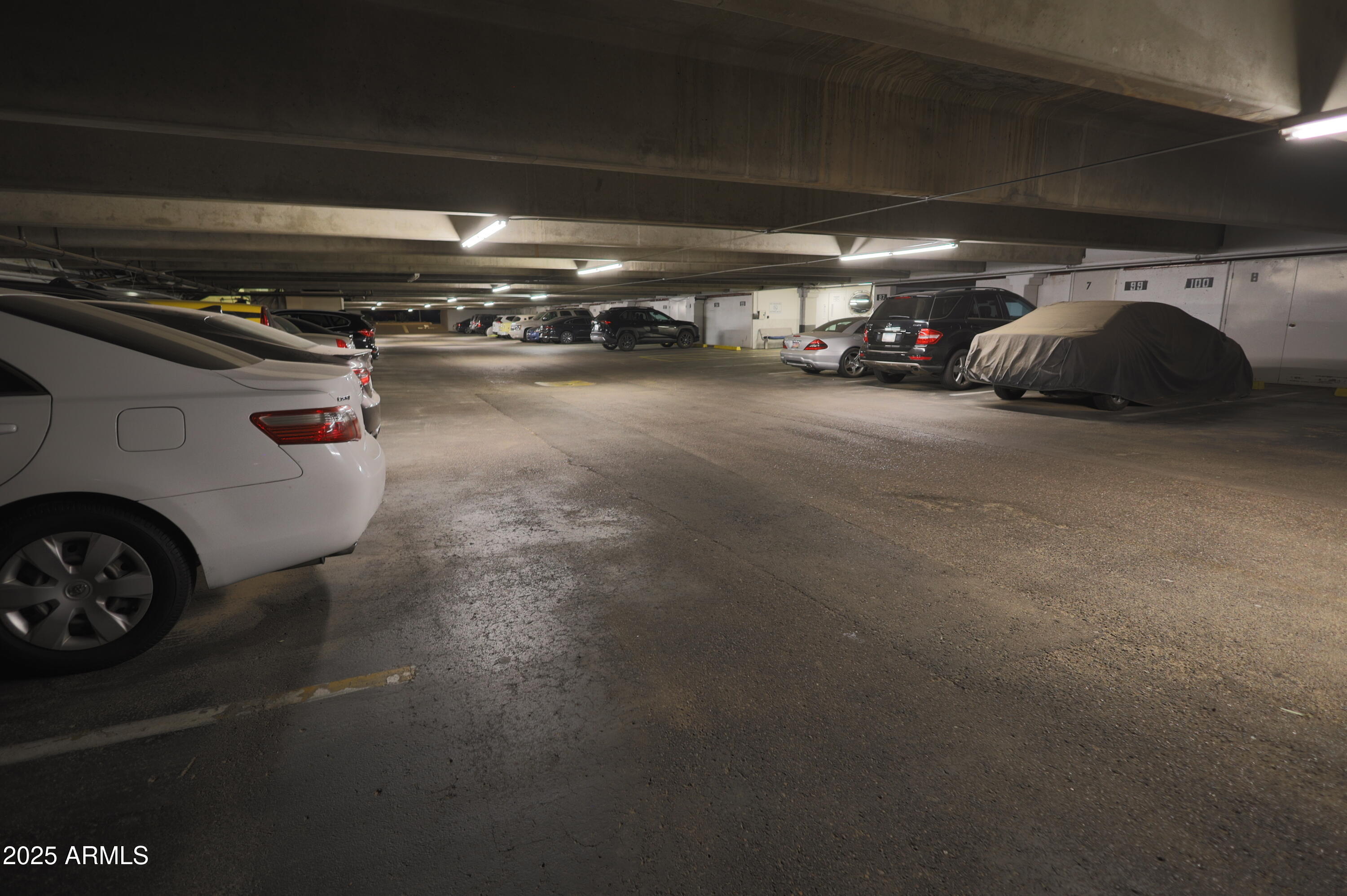7820 East Camelback Road, Unit 309 Scottsdale, AZ 85251 - Photo 41 of 55 a view of parking garage with cars