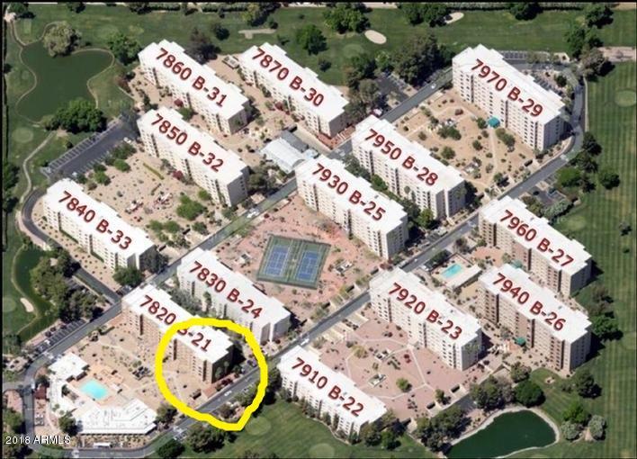 7820 East Camelback Road, Unit 309 Scottsdale, AZ 85251 - Photo 42 of 55 an aerial view of a house with a swimming pool