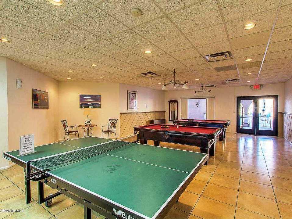 7820 East Camelback Road, Unit 309 Scottsdale, AZ 85251 - Photo 47 of 55 a room with pool table and windows
