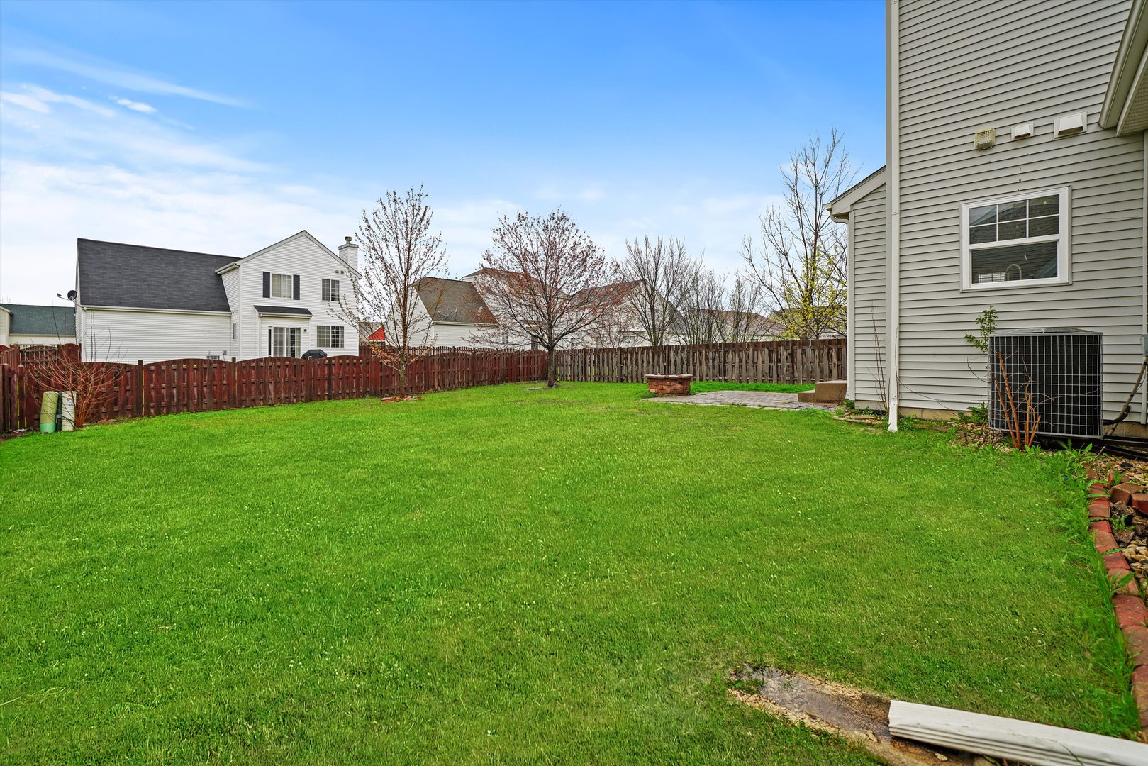 790 Montclair Drive Round Lake, IL 60073 - Photo 18 of 21 a view of a house with a yard and sitting area