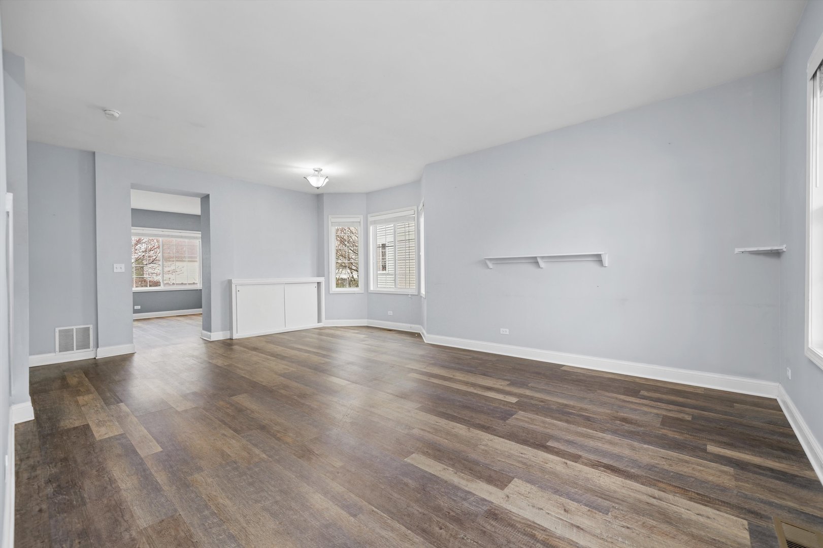 790 Montclair Drive Round Lake, IL 60073 - Photo 2 of 21 a view of empty room with wooden floor