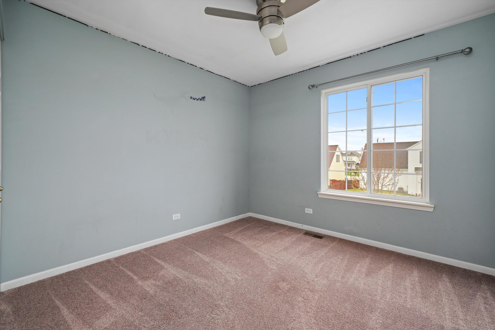 790 Montclair Drive Round Lake, IL 60073 - Photo 10 of 21 an empty room with a window