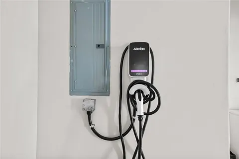 a view of a wrought iron fences in front of yard