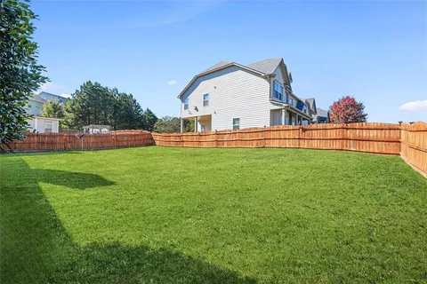 a view of a chairs in front of house
