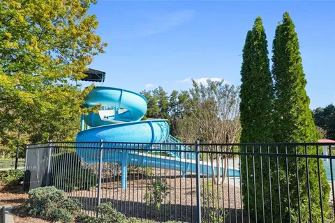 a picture of a bathroom with a shower