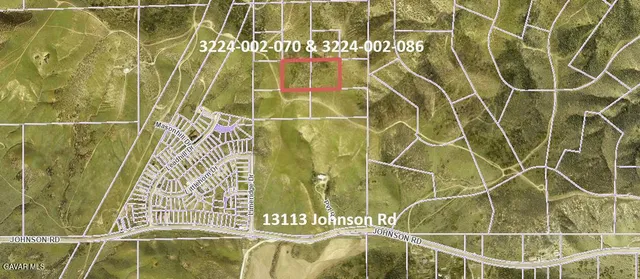 a bathroom with a shower and a glass door