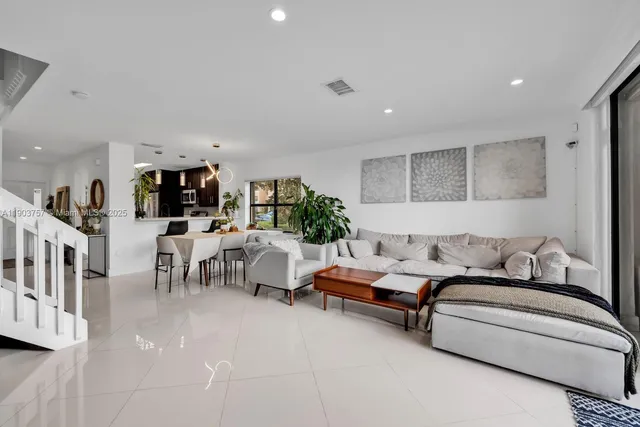 a living room with furniture and a couch