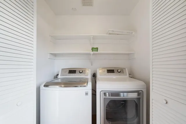 a view of balcony with wooden floor