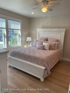 216 Eisenhower Avenue Seaside Heights, NJ 08751 - Photo 12 of 43 a bedroom with a bed and window